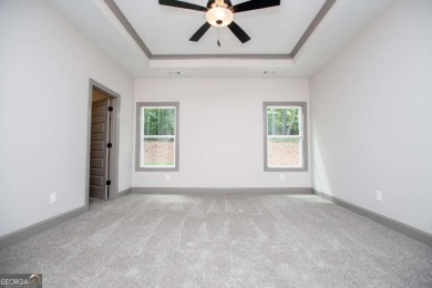 Tired of cookie-cutter homes? This stunning new construction by on Fairfield Plantation Golf and Country Club in Georgia - for sale on GolfHomes.com, golf home, golf lot