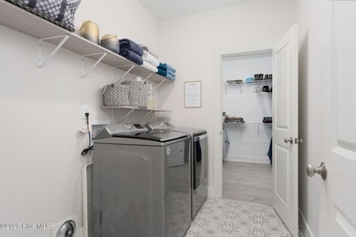 This is the one you've been waiting for! It shows like a model on Topsail Green Golf Club in North Carolina - for sale on GolfHomes.com, golf home, golf lot