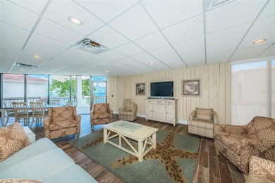 Tranquil views from this 2-bedroom 2-bathroom condo which is on Isla Del Sol Yacht and Country Club in Florida - for sale on GolfHomes.com, golf home, golf lot