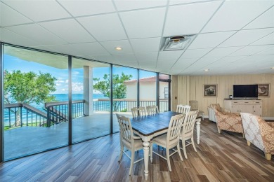 Tranquil views from this 2-bedroom 2-bathroom condo which is on Isla Del Sol Yacht and Country Club in Florida - for sale on GolfHomes.com, golf home, golf lot