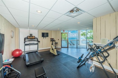 Tranquil views from this 2-bedroom 2-bathroom condo which is on Isla Del Sol Yacht and Country Club in Florida - for sale on GolfHomes.com, golf home, golf lot