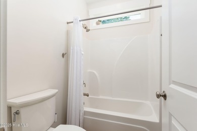 This is the one you've been waiting for! It shows like a model on Topsail Green Golf Club in North Carolina - for sale on GolfHomes.com, golf home, golf lot