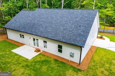 Tired of cookie-cutter homes? This stunning new construction by on Fairfield Plantation Golf and Country Club in Georgia - for sale on GolfHomes.com, golf home, golf lot