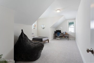 This is the one you've been waiting for! It shows like a model on Topsail Green Golf Club in North Carolina - for sale on GolfHomes.com, golf home, golf lot