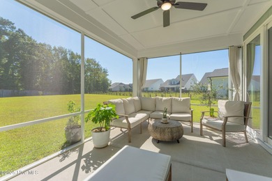 This is the one you've been waiting for! It shows like a model on Topsail Green Golf Club in North Carolina - for sale on GolfHomes.com, golf home, golf lot