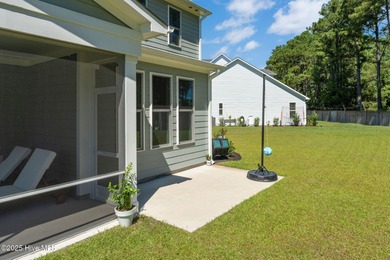 This is the one you've been waiting for! It shows like a model on Topsail Green Golf Club in North Carolina - for sale on GolfHomes.com, golf home, golf lot