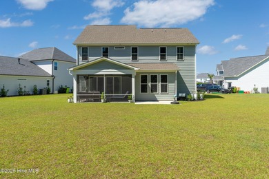 This is the one you've been waiting for! It shows like a model on Topsail Green Golf Club in North Carolina - for sale on GolfHomes.com, golf home, golf lot