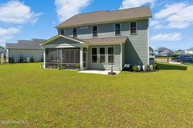 This is the one you've been waiting for! It shows like a model on Topsail Green Golf Club in North Carolina - for sale on GolfHomes.com, golf home, golf lot