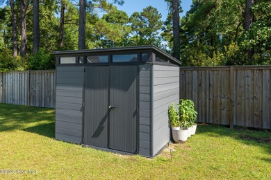 This is the one you've been waiting for! It shows like a model on Topsail Green Golf Club in North Carolina - for sale on GolfHomes.com, golf home, golf lot