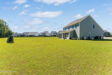 This is the one you've been waiting for! It shows like a model on Topsail Green Golf Club in North Carolina - for sale on GolfHomes.com, golf home, golf lot