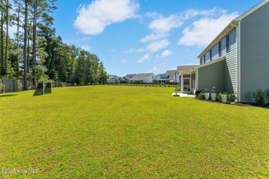 This is the one you've been waiting for! It shows like a model on Topsail Green Golf Club in North Carolina - for sale on GolfHomes.com, golf home, golf lot