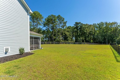 This is the one you've been waiting for! It shows like a model on Topsail Green Golf Club in North Carolina - for sale on GolfHomes.com, golf home, golf lot
