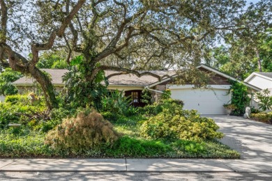 Welcome to this beautifully landscaped corner lot home located on Beacon Woods Golf Club in Florida - for sale on GolfHomes.com, golf home, golf lot