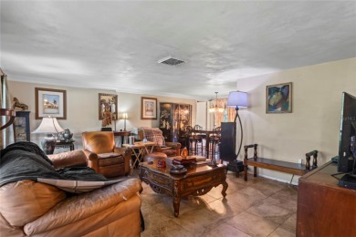 Welcome to this beautifully landscaped corner lot home located on Beacon Woods Golf Club in Florida - for sale on GolfHomes.com, golf home, golf lot