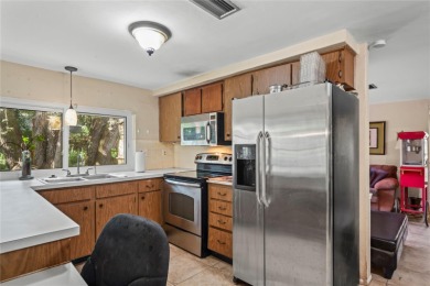 Welcome to this beautifully landscaped corner lot home located on Beacon Woods Golf Club in Florida - for sale on GolfHomes.com, golf home, golf lot