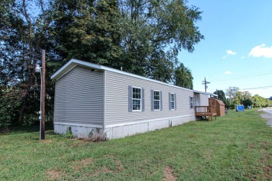 Single wide trailer on .340 acres in Pleasants County, West on Saint Marys Golf Club in West Virginia - for sale on GolfHomes.com, golf home, golf lot