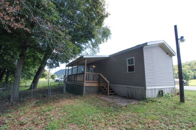 Single wide trailer on .340 acres in Pleasants County, West on Saint Marys Golf Club in West Virginia - for sale on GolfHomes.com, golf home, golf lot