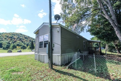 Single wide trailer on .340 acres in Pleasants County, West on Saint Marys Golf Club in West Virginia - for sale on GolfHomes.com, golf home, golf lot