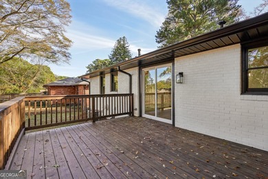 Luxury living on a budget! Picture a home that minds its on Browns Mill Golf Course in Georgia - for sale on GolfHomes.com, golf home, golf lot