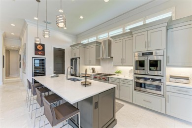 Exceptional custom home in the beautiful, gated enclave of on IMG Academies Golf and Country Club in Florida - for sale on GolfHomes.com, golf home, golf lot