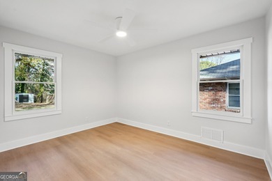 Luxury living on a budget! Picture a home that minds its on Browns Mill Golf Course in Georgia - for sale on GolfHomes.com, golf home, golf lot