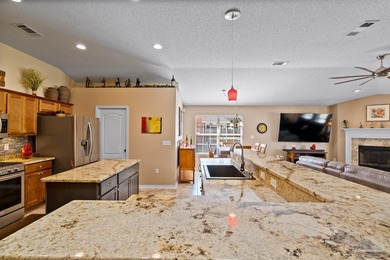 Welcome to this beautifully designed semi-custom built on Tanglewood Golf Club in Florida - for sale on GolfHomes.com, golf home, golf lot