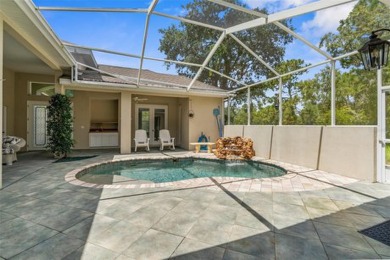 Enjoy Florida living at its finest! This beautiful Courtyard on Southern Woods Golf Club in Florida - for sale on GolfHomes.com, golf home, golf lot