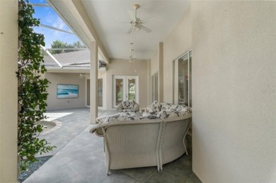 Enjoy Florida living at its finest! This beautiful Courtyard on Southern Woods Golf Club in Florida - for sale on GolfHomes.com, golf home, golf lot