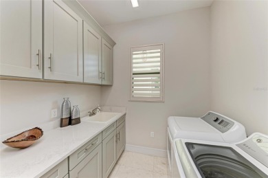 Exceptional custom home in the beautiful, gated enclave of on IMG Academies Golf and Country Club in Florida - for sale on GolfHomes.com, golf home, golf lot