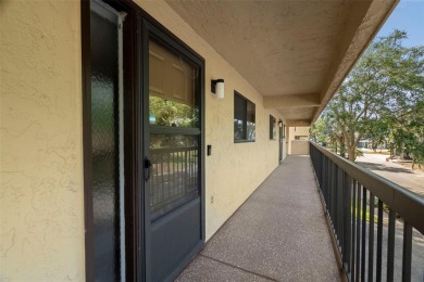 Welcome to your dream 2 bedroom, 2 bath condo in the heart of on Tarpon Springs Golf Course in Florida - for sale on GolfHomes.com, golf home, golf lot