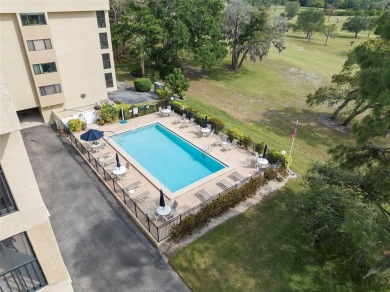 Welcome to your dream 2 bedroom, 2 bath condo in the heart of on Tarpon Springs Golf Course in Florida - for sale on GolfHomes.com, golf home, golf lot