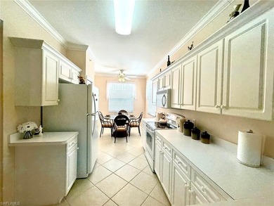 Located in the heart of Estero, this beautiful 2-Bedroom + Den on Estero Country Club in Florida - for sale on GolfHomes.com, golf home, golf lot