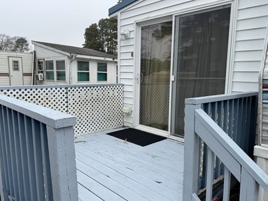 Cleared lot with camper with addition.  Lot is fully stoned...NO on Captains Cove Golf and Yacht Club in Virginia - for sale on GolfHomes.com, golf home, golf lot