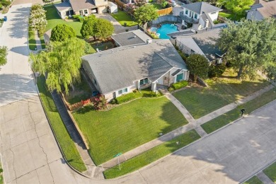 Looking for a peaceful retreat? Suburban tranquility with easy on Mesquite Municipal Golf Course in Texas - for sale on GolfHomes.com, golf home, golf lot