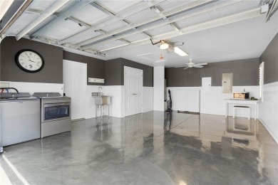 This BETTER-THAN-NEW, UPSCALE home is one of the LARGEST and on Evans Prairie Golf and Country Club in Florida - for sale on GolfHomes.com, golf home, golf lot