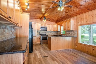 This home is ready for new owners to move right in.  Located on on The Falls At Barber Creek in Michigan - for sale on GolfHomes.com, golf home, golf lot