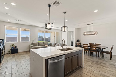 The Carlyle's inviting covered porch and entry flow into the on Sterling Grove Golf & Country Club in Arizona - for sale on GolfHomes.com, golf home, golf lot