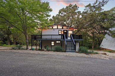 Discover your dream getaway at this idyllic lakehouse nestled in on Tanglewood Resort in Texas - for sale on GolfHomes.com, golf home, golf lot