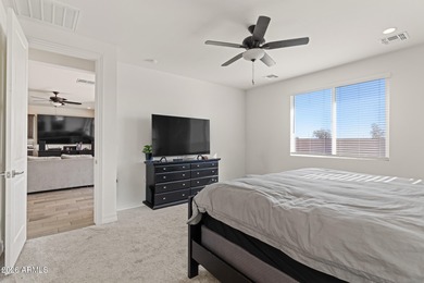 The Carlyle's inviting covered porch and entry flow into the on Sterling Grove Golf & Country Club in Arizona - for sale on GolfHomes.com, golf home, golf lot