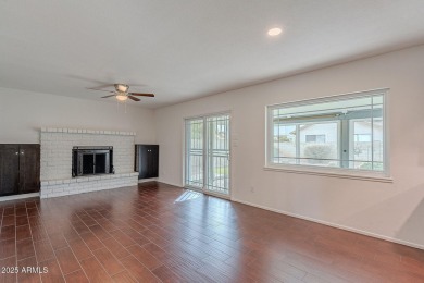 This charming Dobson Ranch home is freshly painted throughout on Dobson Ranch Municipal Golf Course in Arizona - for sale on GolfHomes.com, golf home, golf lot