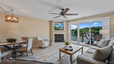 WOW!! BRAND NEW Living Area LVP and furnishings invite you into on Lake Valley Country Club in Missouri - for sale on GolfHomes.com, golf home, golf lot