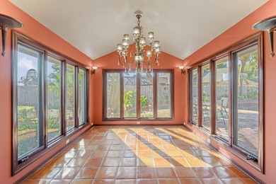 From the moment you step inside this fully renovated designer on Indian Bayou Golf and Country Club in Florida - for sale on GolfHomes.com, golf home, golf lot