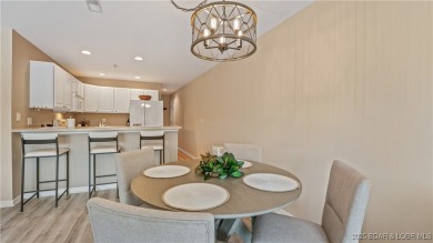 WOW!! BRAND NEW Living Area LVP and furnishings invite you into on Lake Valley Country Club in Missouri - for sale on GolfHomes.com, golf home, golf lot