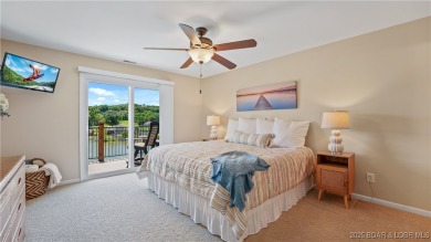 WOW!! BRAND NEW Living Area LVP and furnishings invite you into on Lake Valley Country Club in Missouri - for sale on GolfHomes.com, golf home, golf lot