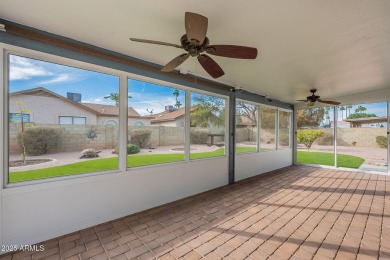 This charming Dobson Ranch home is freshly painted throughout on Dobson Ranch Municipal Golf Course in Arizona - for sale on GolfHomes.com, golf home, golf lot