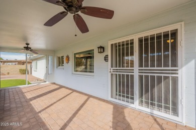 This charming Dobson Ranch home is freshly painted throughout on Dobson Ranch Municipal Golf Course in Arizona - for sale on GolfHomes.com, golf home, golf lot