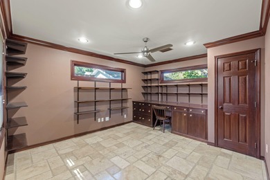 From the moment you step inside this fully renovated designer on Indian Bayou Golf and Country Club in Florida - for sale on GolfHomes.com, golf home, golf lot
