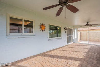 This charming Dobson Ranch home is freshly painted throughout on Dobson Ranch Municipal Golf Course in Arizona - for sale on GolfHomes.com, golf home, golf lot