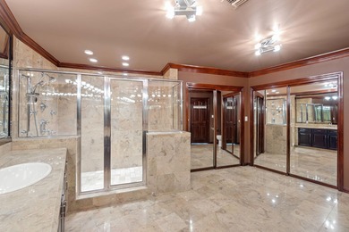 From the moment you step inside this fully renovated designer on Indian Bayou Golf and Country Club in Florida - for sale on GolfHomes.com, golf home, golf lot