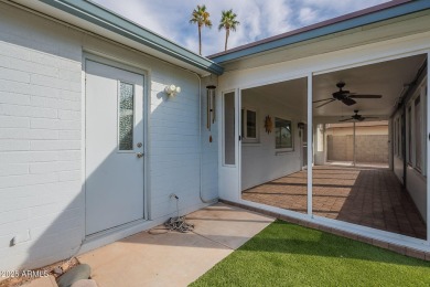 This charming Dobson Ranch home is freshly painted throughout on Dobson Ranch Municipal Golf Course in Arizona - for sale on GolfHomes.com, golf home, golf lot